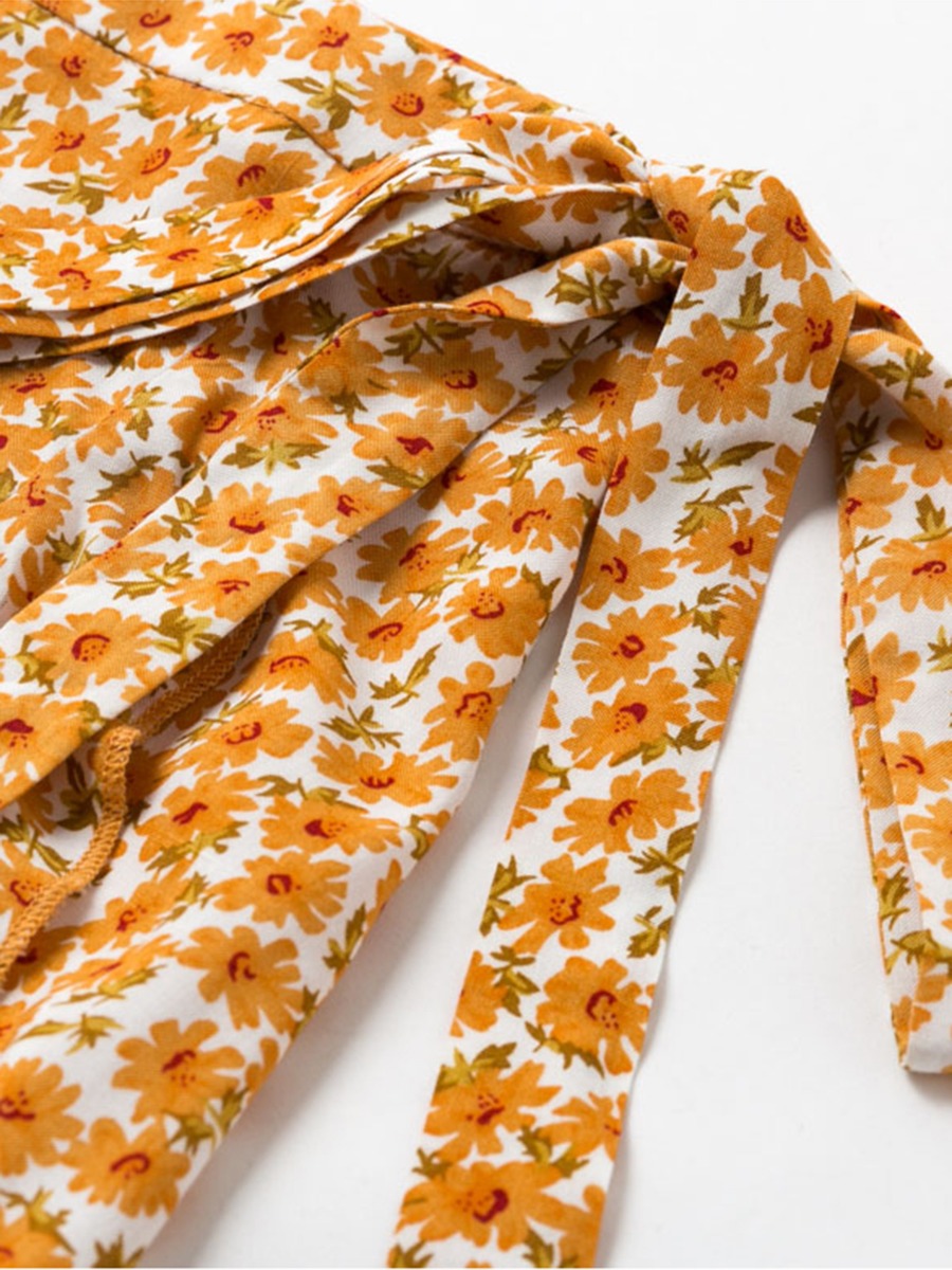 Irregular Ruffle Hem Tie-up Slit Floral Skirt